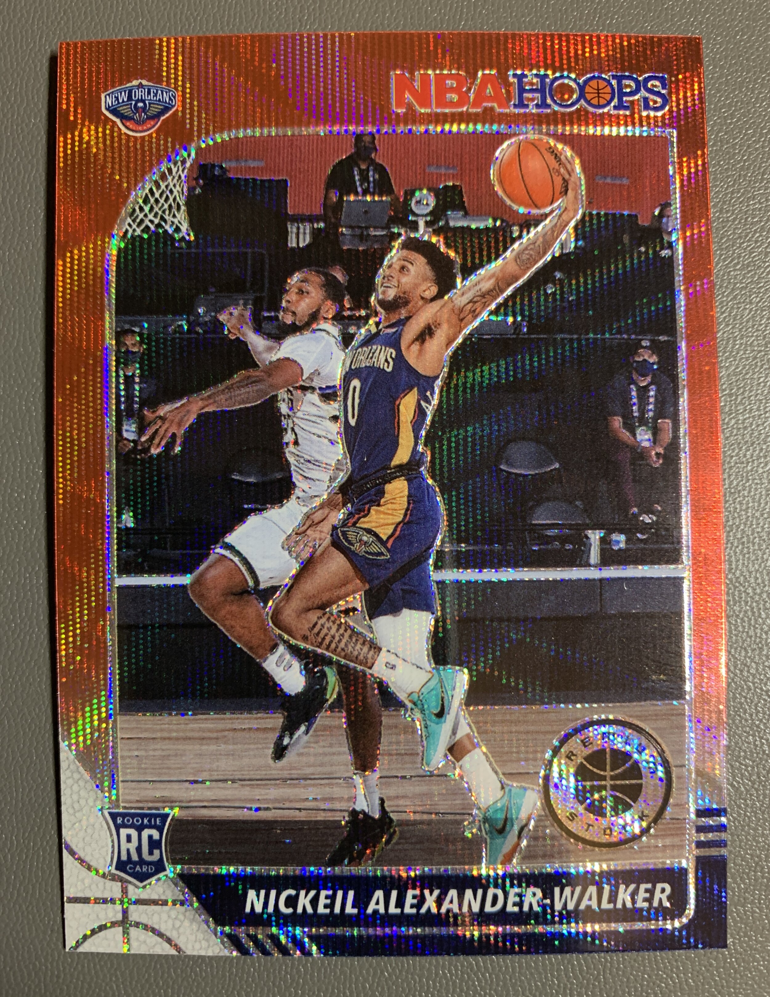 Here’s what a Red Wave card looks like. Not to be confused with Pulsars or Flash. Another nice rookie card photo. Also, another nod to the lack of quality control at Panini. It’s 2021, can’t we cut cards in a way that produces centering better than …